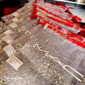 MAC new set of 7 for 12$ Cosmetic Bags with Red Accents draw string washable